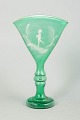L'Art presents: Mary Gregory style green glass goblet, hand-enamelled figural motif.