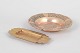 L'Art presents: Two brass ashtrays.