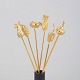 L'Art presents: Skultuna, set of six cocktail sticks with fruit and vegetable motifs.