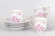 L'Art presents: Set of four Hollóháza coffee cups with saucers, pink floral decoration.