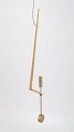 L'Art presents: Pierre Forsell for Skultuna, wall hanging pendulum candle holder.