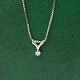 Antik Damgaard-Lauritsen presents: Necklace in 14k white gold with diamond