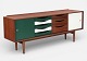 Lundin Antique presents: beautiful low teak sideboard with reversible doors, designed by Bruno Hansen. JP ...