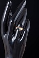 L'Art presents: 14 carat gold ring with green synthetic spinel.