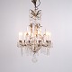 Osted Antik & Design presents: Antique Crystal Chandelier in Gilt Bronze with Louvre Style Decorations 1920s