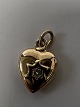 Antik Huset presents: 14 carat gold. Heart with inlaid diamond.Charms / Pendants.Height 1.1 cm.