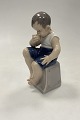 Danam Antik presents: Royal Copenhagen Figurine Boy with Apple No. 1744