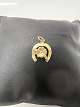 Antik Huset presents: 14 carat gold. Horseshoe with a Four-leaf clover.Charms / Pendants.Height 1.8 cm.