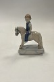 Danam Antik presents: Royal Copenhagen Figurine Girl on Horse No. 5651