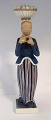 Lundin Antique presents: Royal Copenhagen. Porcelain figure. The woman with the eggs. Model 4844. Height 31 cm. ...