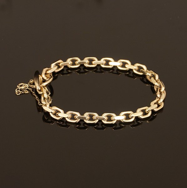 K. Laursens Guldsmedie: Anker armbånd. 8kt guld. L: 19,5cm. V: 26,5gr