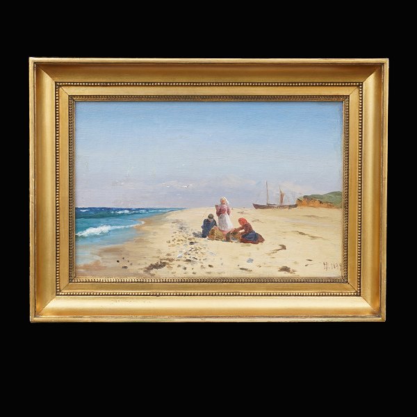 Holger Lübbers, 1850-1931, Strandparti med personer. Olie på lærred. Signeret og 
dateret 1894. Lysmål: 20x30cm. Med ramme: 30x40cm