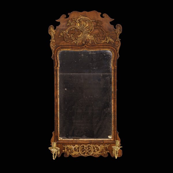 A 18th century gilt walnut mirror. Denmark circa 1760. Size: 90x45cm