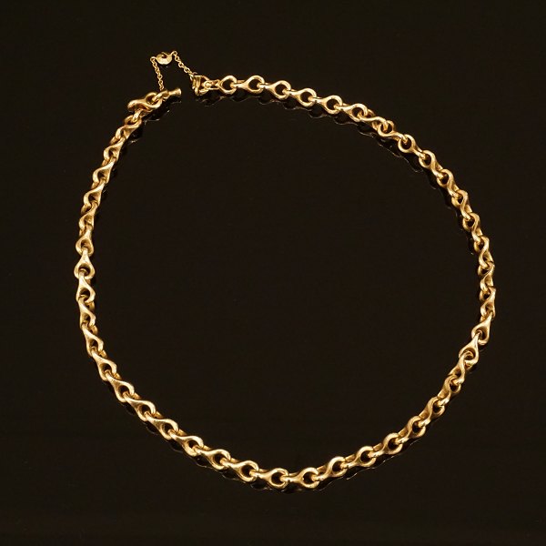 A 14kt gold Ole Lynggaard Copenhagen bracelet. L: 44cm