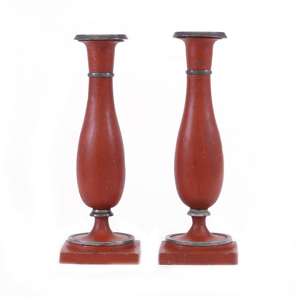 Pair of tulip shaped red decorated pewter candelsticks. Denmark circa 1840. H. 
21cm