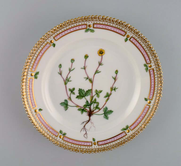 Royal Copenhagen Flora Danica salad plate in hand-painted porcelain with flowers 
and gold decoration. Model number 20/3573.
