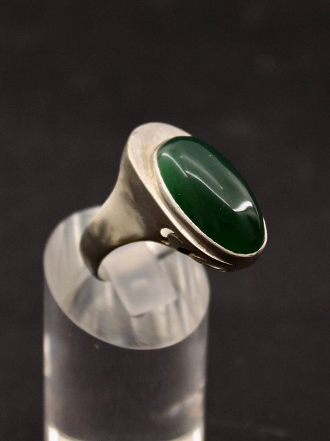 Sterling silver ring with cabochon cut green stone