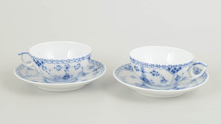 Royal CopenhagenBlue Fluted Half Lace two teacups with saucers, 1980s.