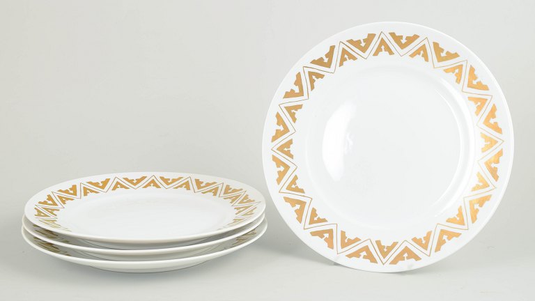 Royal Copenhagen sæt af fire store middagstallerkener.