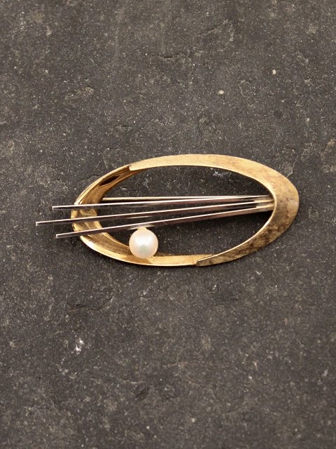 14 karat guld broche med ægte perle